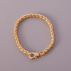 Minimalist gold woven link chain bracelet with a round spring clasp for women