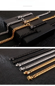 Close-up of 11mm Cuban chain bracelets in gold, silver, and black with zircon clasps