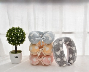 Soft memory foam U-shaped neck pillows with bow patterns in four pastel colors