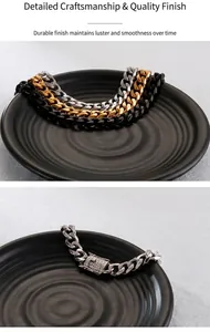 Detail of hip-hop cuban link bracelet with iced-out square clasp in gold, silver and black