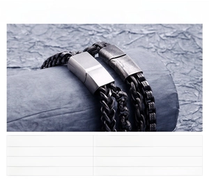 Close-up of vintage double-layer titanium steel chain bracelets in silver and black finish