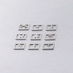 Lot de 9 pendentifs en acier inoxydable avec motifs ajourés d'éléphant et croix