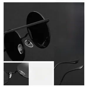 Close-up of ergonomic nose pads and minimalist metal temples on vintage round sunglasses