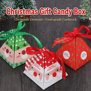 Detail of pyramid Christmas gift box with festive patterns and silk ribbon closure