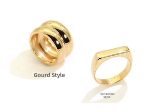 Detail of 18K gold plated wide band rings in gourd and bar signet styles on white background