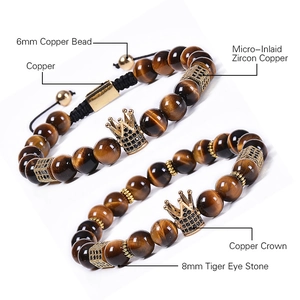 Detail of 8mm tiger eye beads and micro-pave zircon crown on elastic bracelets