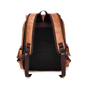 Brown vintage PU leather backpack with padded back straps and side pockets on white background