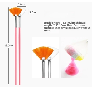 Macro detail of two 18.5cm nail art fan brushes with pink handles and fine bristles