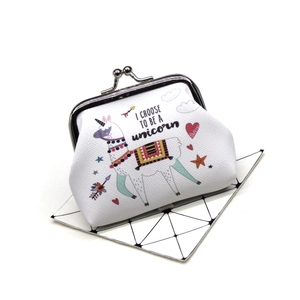 Detail of canvas coin purse featuring cartoon alpaca print and silver metal clasp
