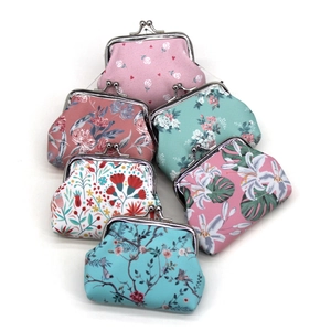 Detailed set of six vintage floral canvas coin purses with metal clasp in various patterns