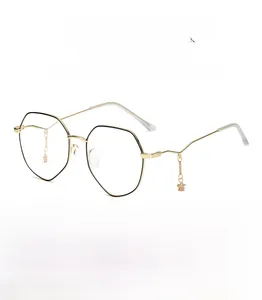 Detailed view of polygonal metal eyeglass frames with star charms and silicone nose pads