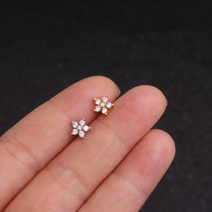 Polished flower stud earrings with sparkling cubic zirconia in gold and silver plating