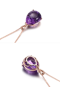 Macro view of rose gold necklace featuring a pear-cut purple gemstone with diamond accents