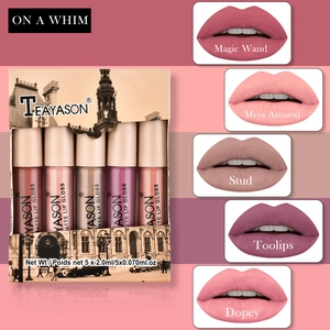 Detail showing five matte lip glaze shades with vintage architecture packaging design