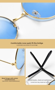 Detail of round sunglasses with blue lenses, golden metal hinges, and soft nose pads