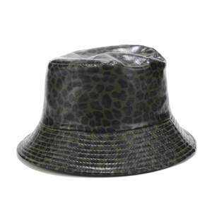 Detailed view of glossy dark green leopard print PU leather bucket hat with stitching