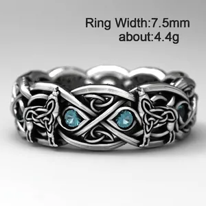 Retro wolf totem ring with blue stones and Celtic knots in silver, 7.5mm width