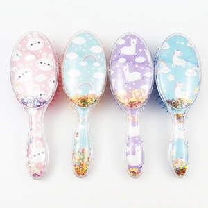 Detail of four cartoon hairbrushes with colorful sequins and cute animal patterns