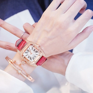 Women's elegant square gold watch with red leather strap and matching star bracelet set