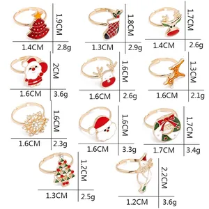 Cartoon Christmas rings for kids featuring snowman, reindeer, and Santa Claus motifs