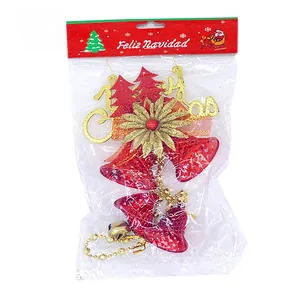 Red and gold Christmas tree hanging ornaments with bells and Merry Christmas lettering