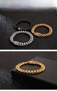 Detailed view of hip hop Cuban link bracelets in gold, silver and black with diamond clasps