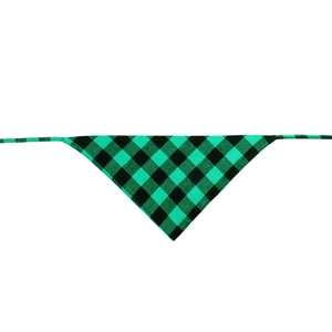 Detail shot of green and black buffalo plaid cotton dog bandana with tie-on design