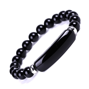 Minimalist black polished bead bracelet with curved bar accent and silver spacers