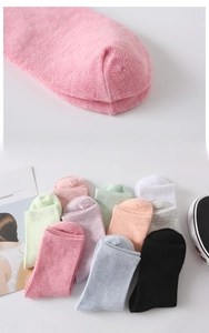 Close-up of seamless toe stitching and colorful cotton crew socks for women