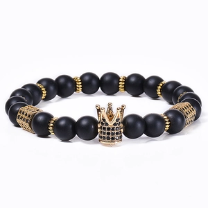 Men's matte black stone bracelet set with gold crown and micro-pave zircon beads