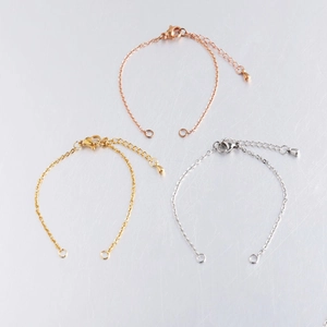 Detailed set of jewelry extender chains in rose gold, gold, and silver with lobster clasps
