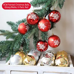 Detail of 8cm Christmas ornaments with painted stars on red and gold festive balls