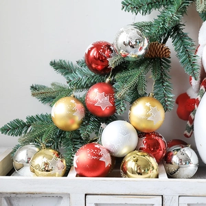 Set of red, gold, and silver 8cm Christmas baubles with white star patterns for tree decor