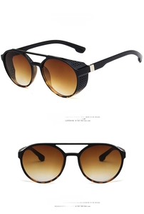 Macro detail of steampunk sunglasses with leopard print frames and metal side shields