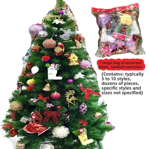 Close-up of assorted Christmas tree ornaments including stars, bells, and deer in bulk pack