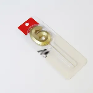 Detailed view of golden number 6 birthday candle in packaging with 5cm size marker