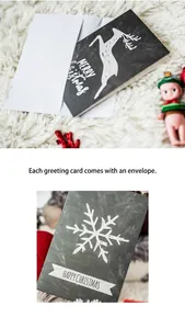 Detail of chalkboard style Christmas cards with white reindeer and snowflake motifs