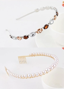 Detail of crystal and pearl headbands with silver and gold alloy bases and combs