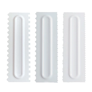 Set of 3 white plastic cream scrapers with jagged edges for cake decorating and icing