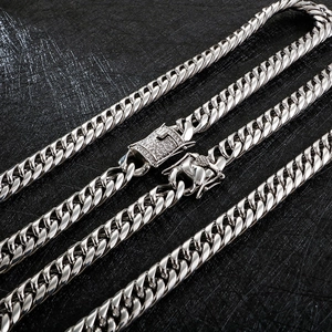 Chunky silver titanium steel Cuban link chain necklace with a sparkling rhinestone buckle