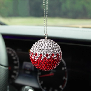 Close-up of sparkling silver and red gradient rhinestone crystal ball car mirror charm