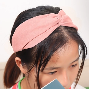 Pink twisted knot elastic headband for women in soft matte fabric for daily styling