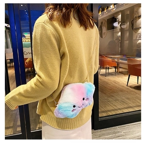 Close-up of cute macaron gradient plush cloud bag with embroidery and gold chain strap