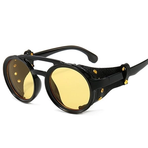 Steampunk round sunglasses with yellow lenses, black leather side shields and gold rivets