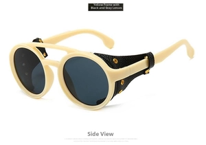 Detail of vintage steampunk sunglasses with beige frame and side leather shields