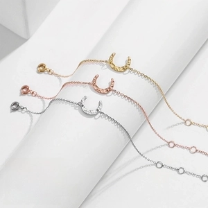 Three-color crescent moon bracelets in 316L stainless steel with hammered texture detail