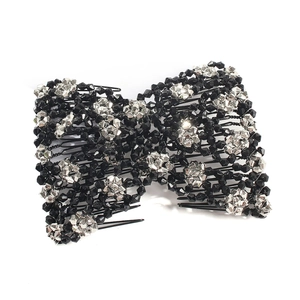 Handmade beaded magic hair comb with black and silver faceted crystal beads on white background