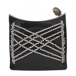 Detail of silver magic hair comb with flexible beaded mesh on branded display card