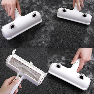 Rouleau blanc portable pour enlever les poils de chien et chat sur les tapis et canapés