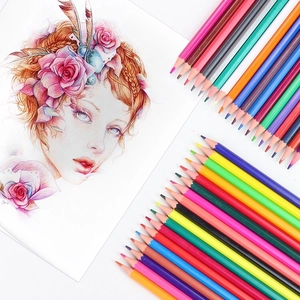 Macro detail of assorted colored pencils next to a realistic hand-drawn portrait sketch